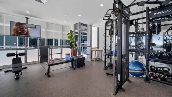 a view of a patio with swimming pool table and chairs