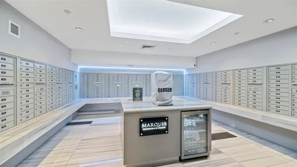 a view of a swimming pool with chairs