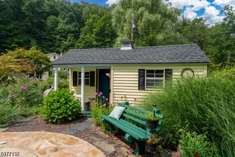 a house view with a garden space