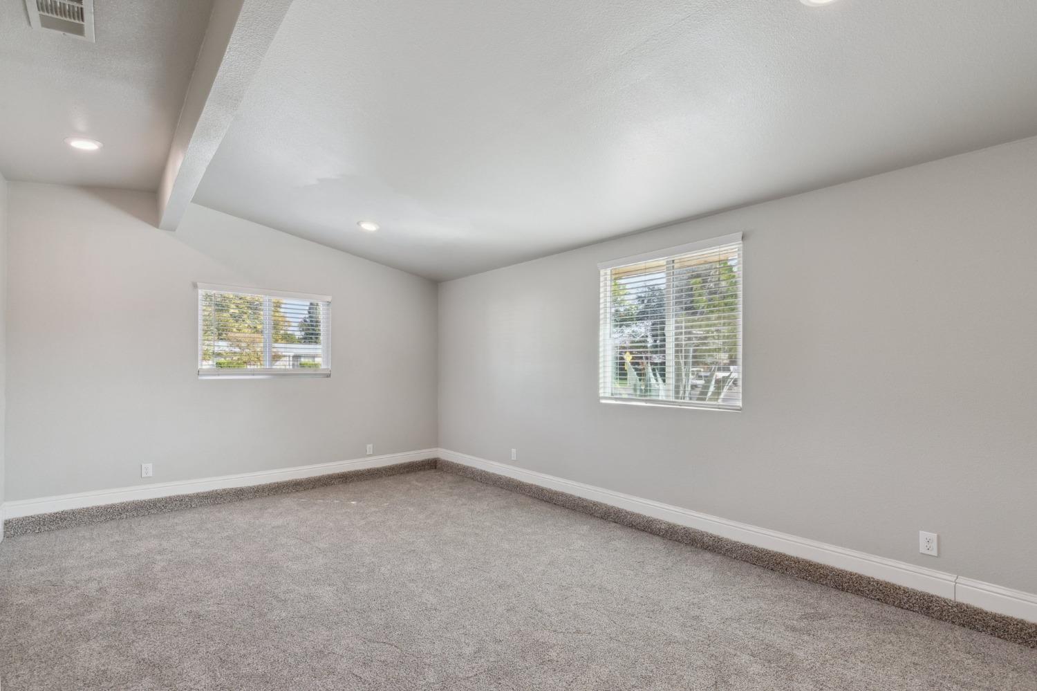 345 Gettysburg Clovis, CA 93612 - Photo 12 of 25 an empty room with a window
