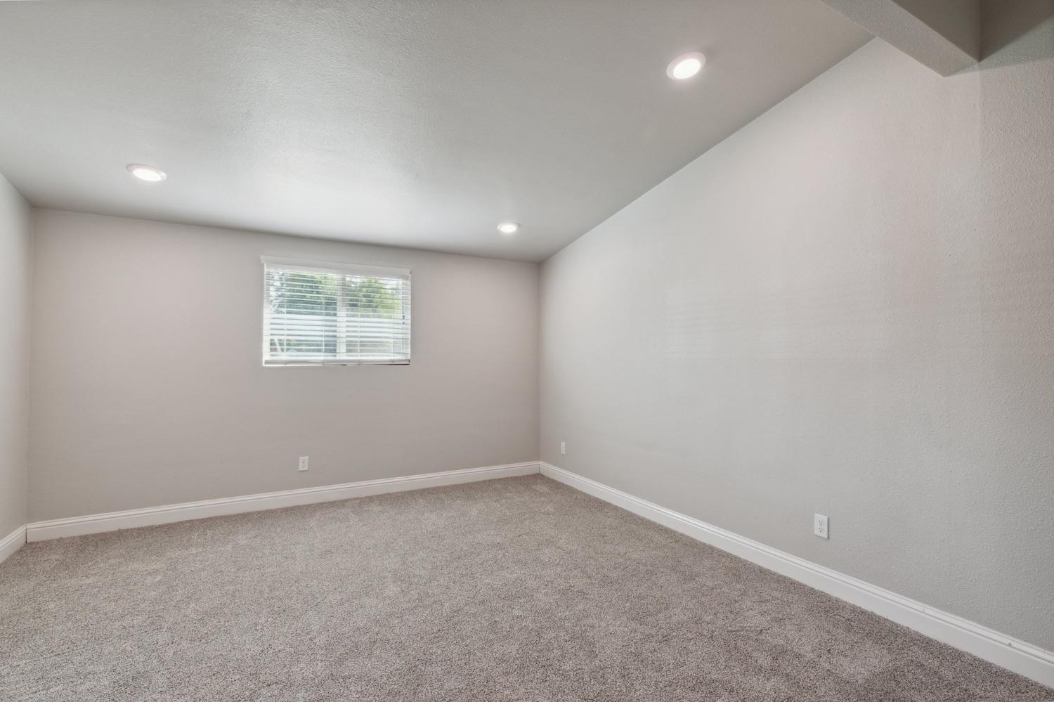 345 Gettysburg Clovis, CA 93612 - Photo 17 of 25 an empty room with a window