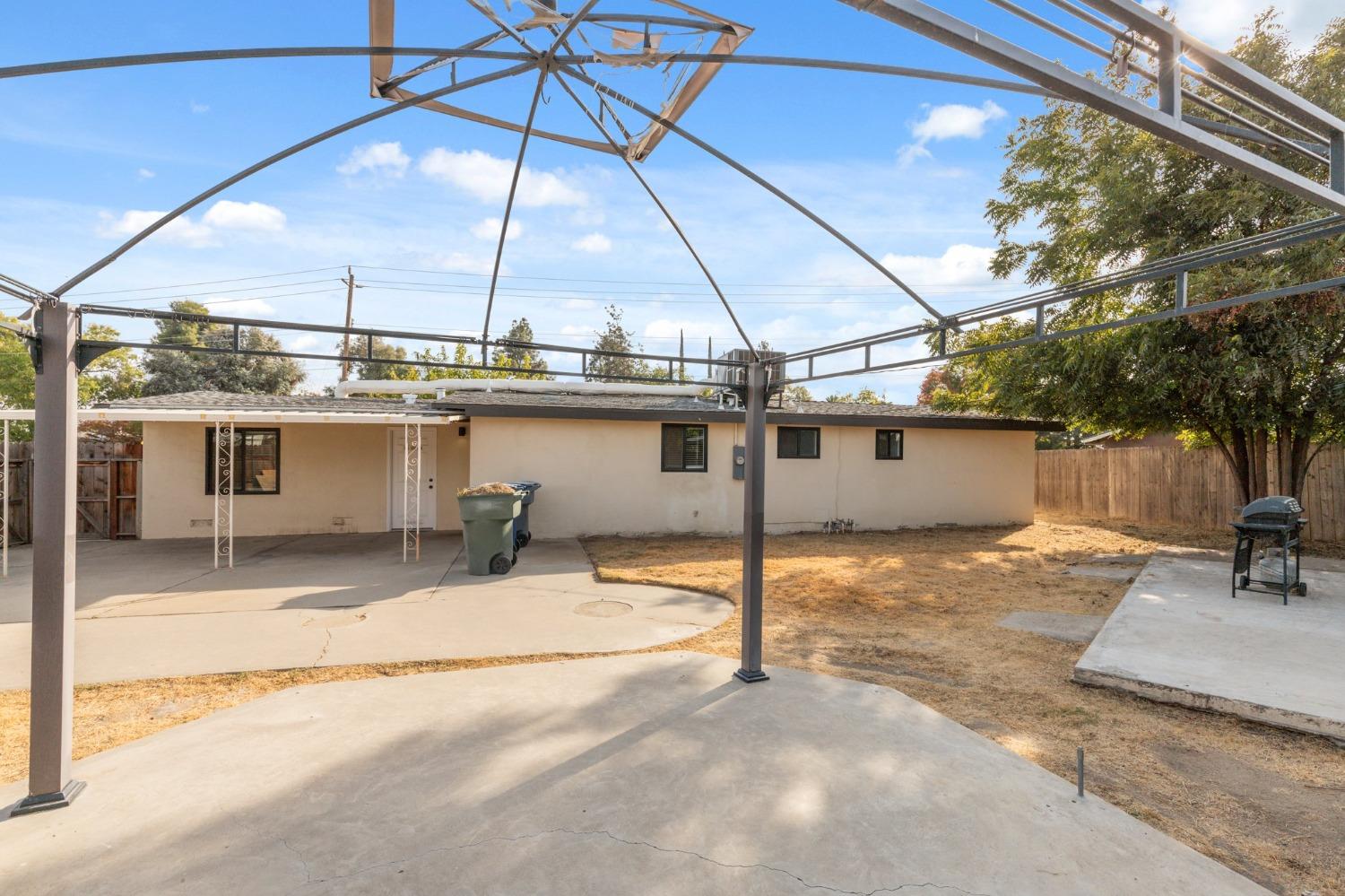 345 Gettysburg Clovis, CA 93612 - Photo 23 of 25 a house view with a backyard space