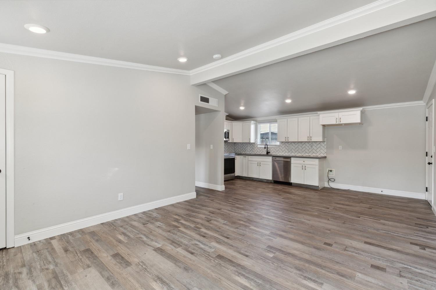 345 Gettysburg Clovis, CA 93612 - Photo 6 of 25 a view of kitchen with wooden floor