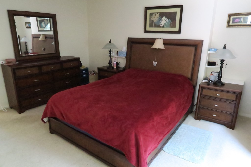 134 Russet Lane, Unit 134 Boxborough, MA 01719 - Photo 11 of 16 a bed room with a bed and a dresser