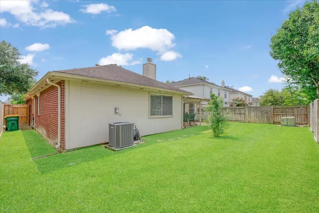 a house view with a garden space