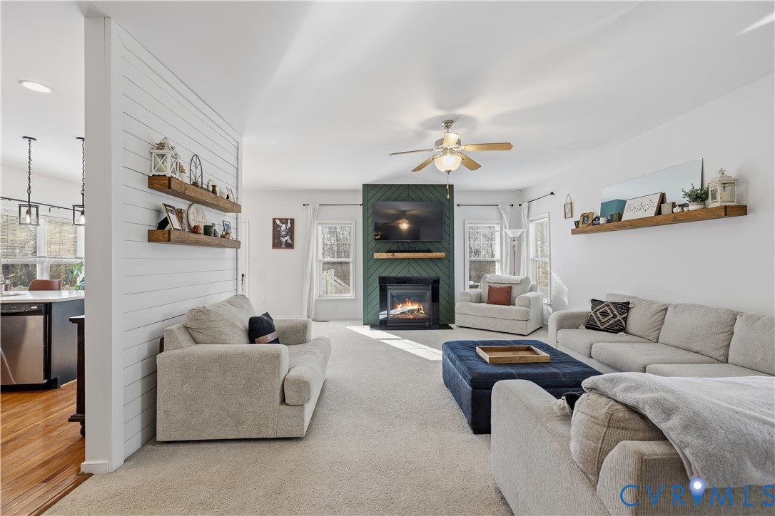 940 Gorham Court Midlothian, VA 23114 - Photo 20 of 45 a living room with furniture and a fireplace