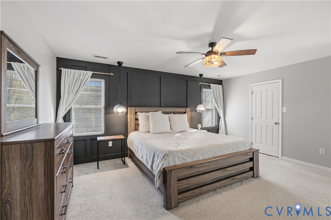 940 Gorham Court Midlothian, VA 23114 - Photo 22 of 45 a bed sitting in a bedroom next to a window