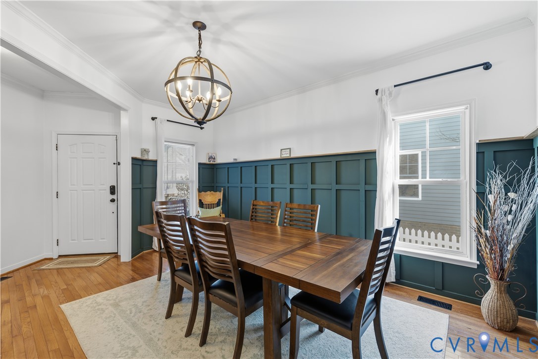 940 Gorham Court Midlothian, VA 23114 - Photo 3 of 45 a view of a dining room with furniture window and wooden floor