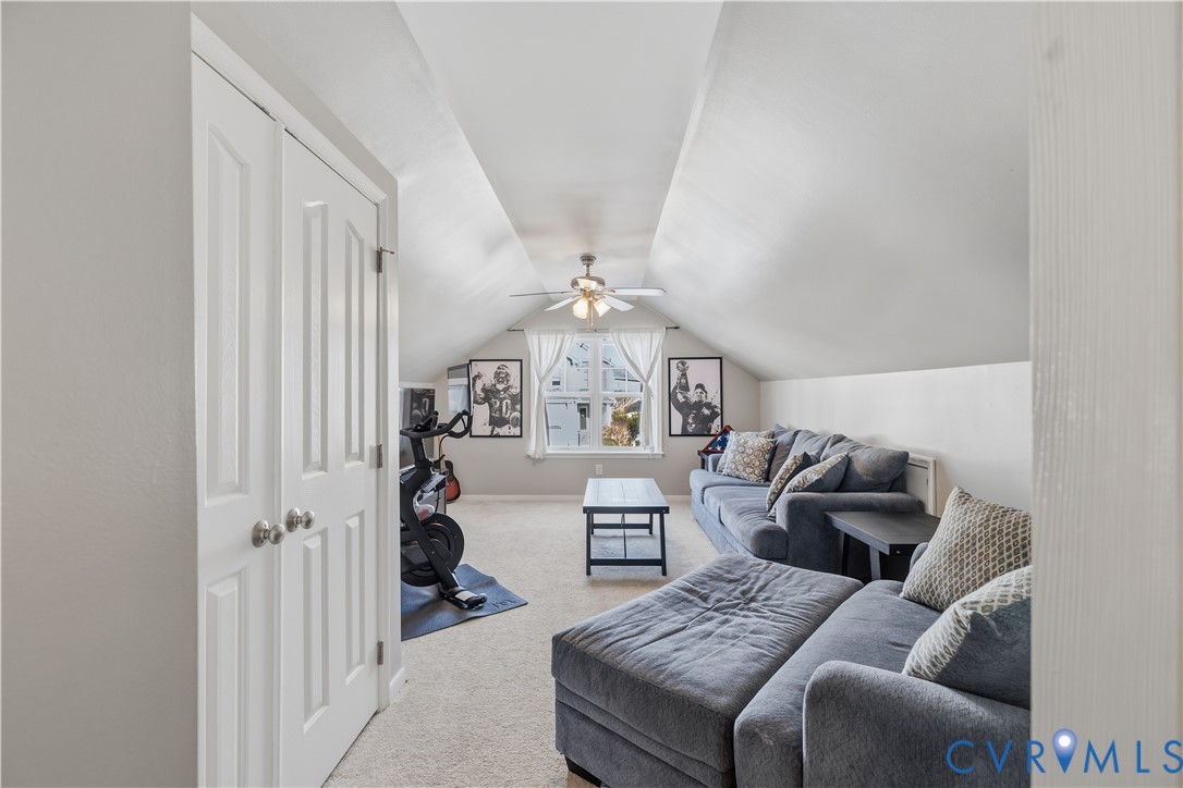 940 Gorham Court Midlothian, VA 23114 - Photo 34 of 45 a living room with furniture and a chandelier