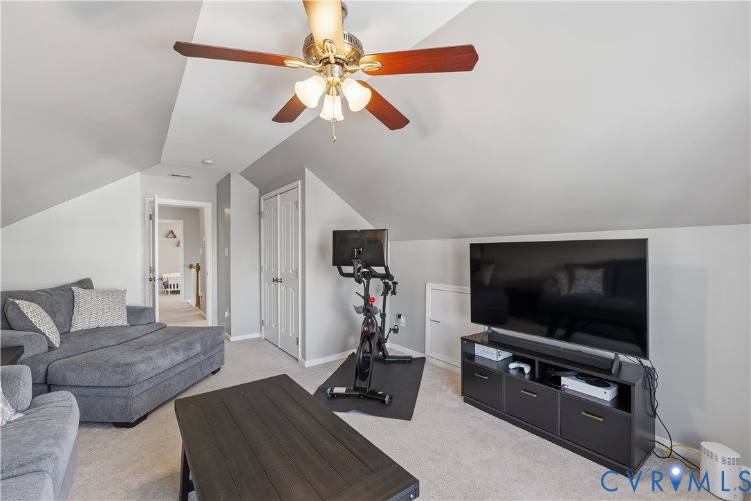 940 Gorham Court Midlothian, VA 23114 - Photo 35 of 45 a living room with furniture and a flat screen tv