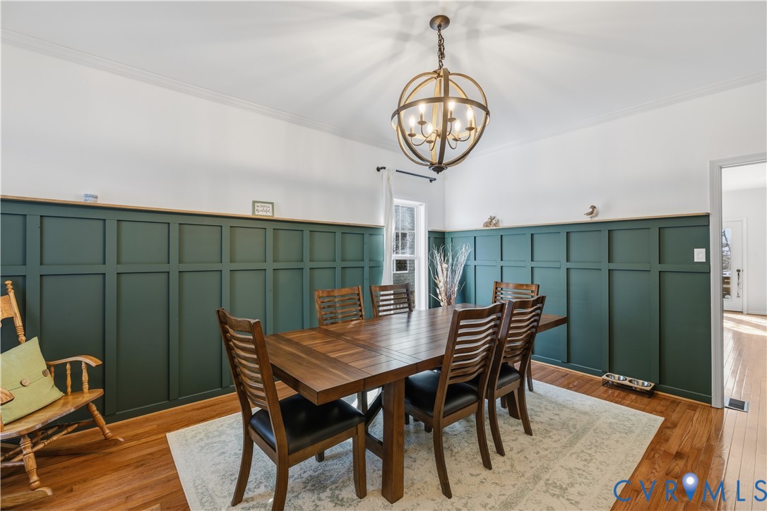 940 Gorham Court Midlothian, VA 23114 - Photo 4 of 45 a view of a dining room with furniture wooden floor and fan