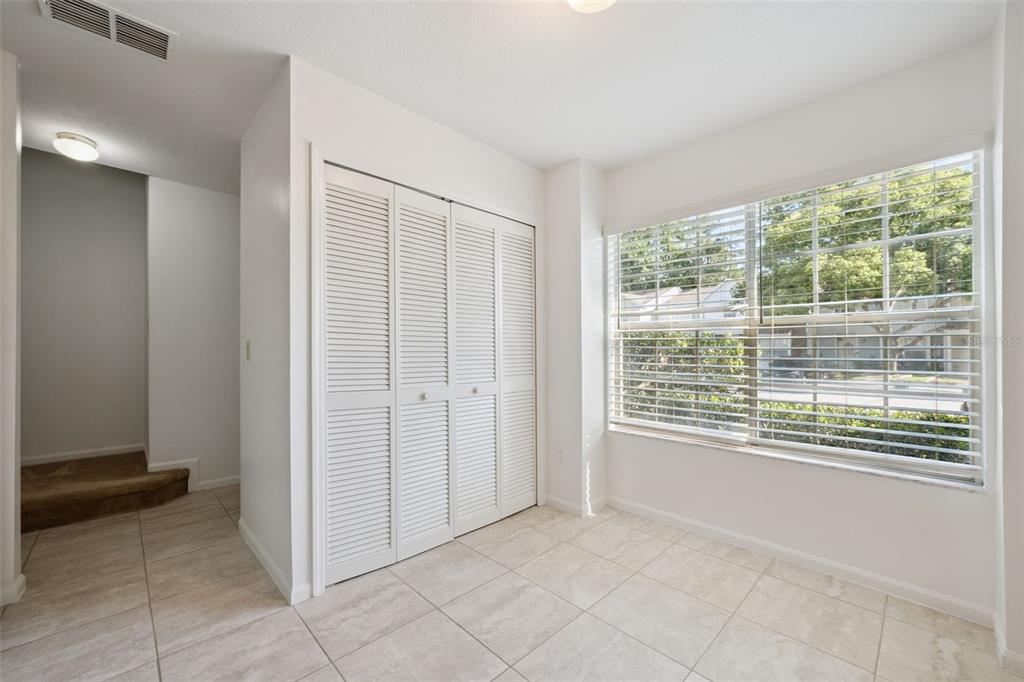 498 Green Spring Circle Winter Springs, FL 32708 - Photo 9 of 20 a view of an empty room with a window