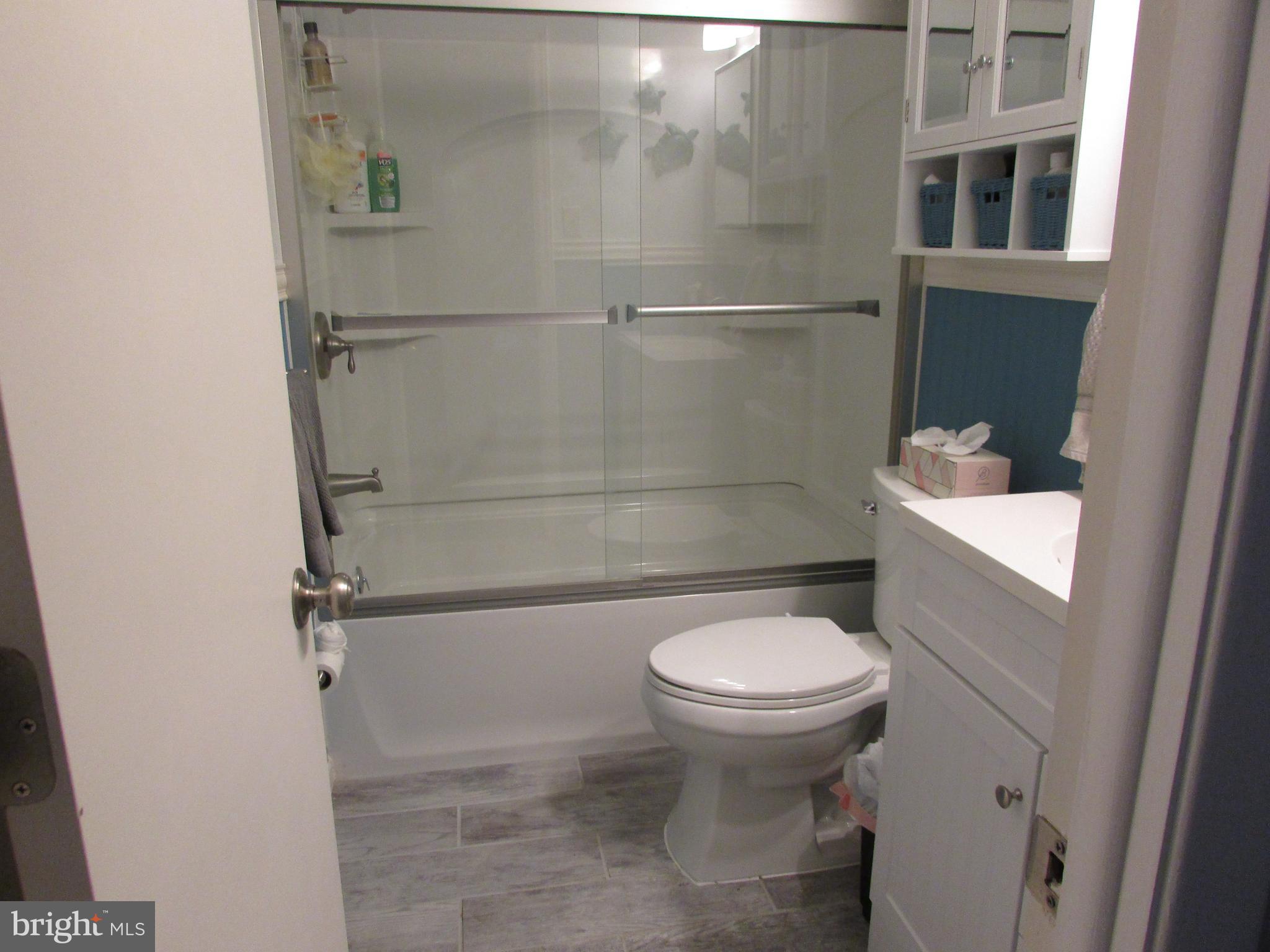 1955 Springer Road Harleysville, PA 19438 - Photo 16 of 46 Remodeled Hall Bath with Beautiful Tile Floor