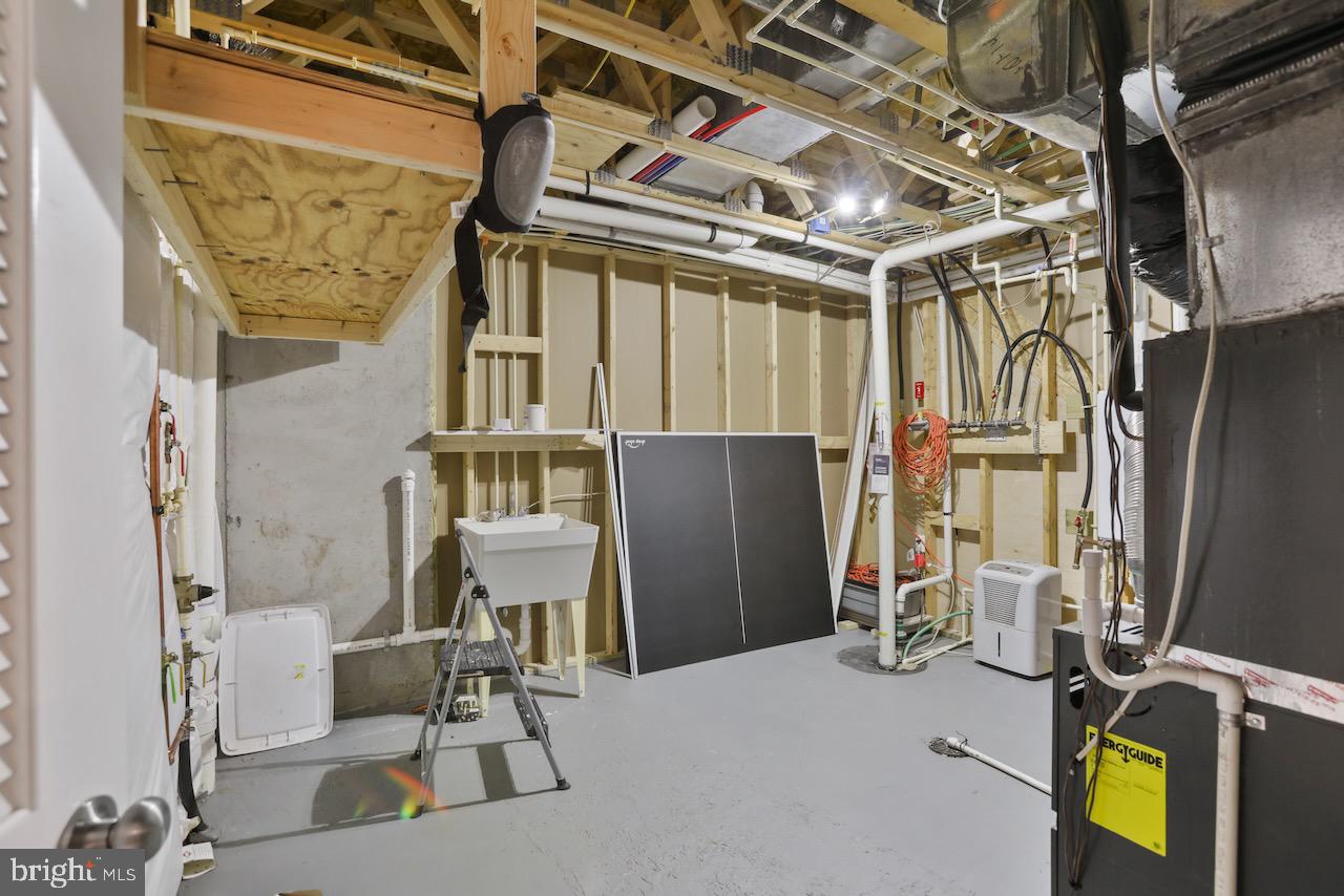 40706 Telluride Court Aldie, VA 20105 - Photo 69 of 70 Utility Room with Tankless Hot Water System
