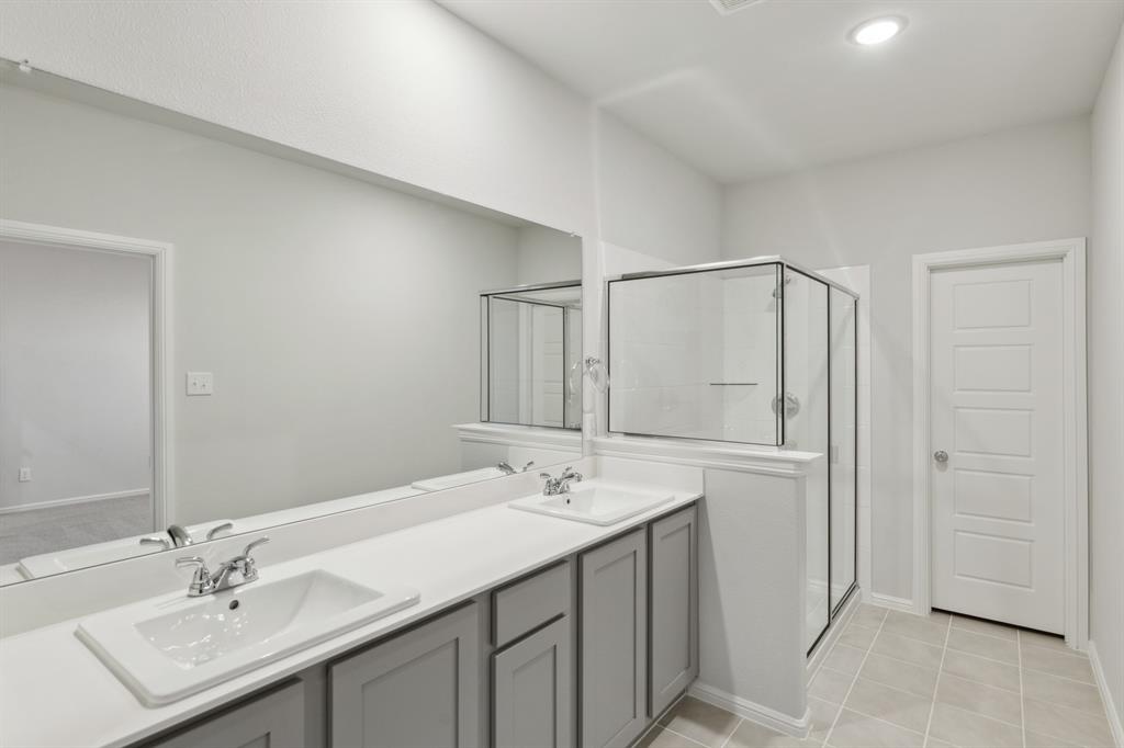 1161 Del Rio Drive Lavon, TX 75166 - Photo 20 of 38 Primary Bathroom in the Holden home plan by Trophy Signature Homes – REPRESENTATIVE PHOTO