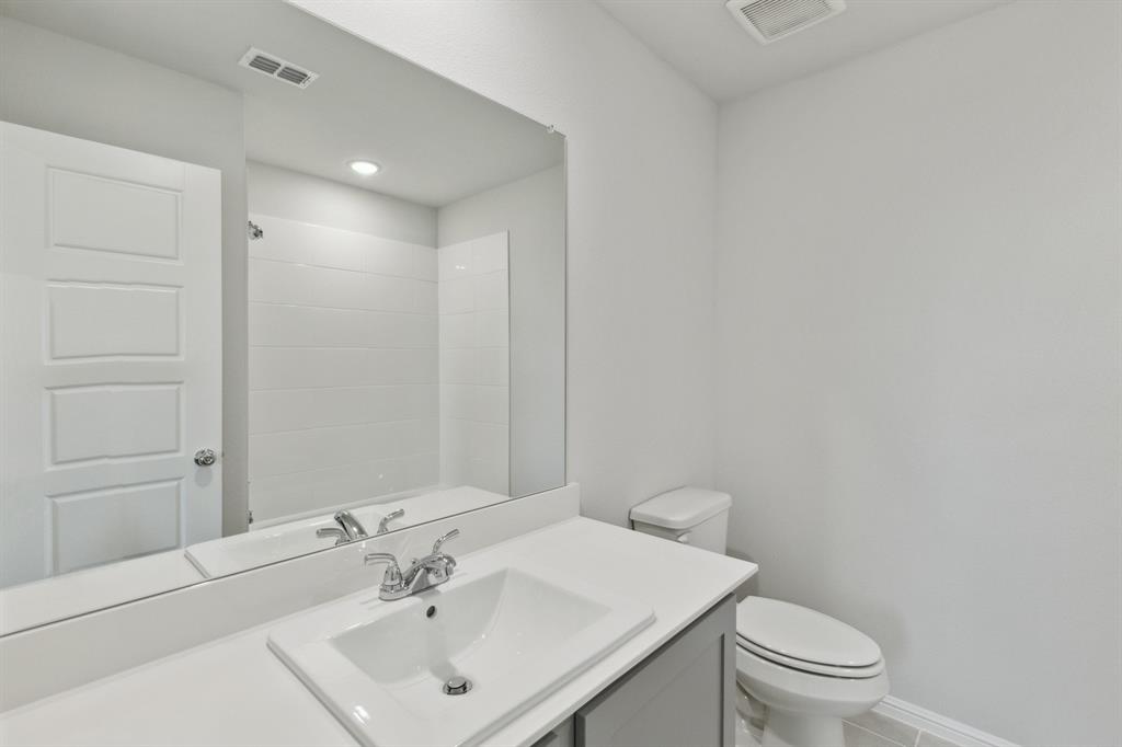 1161 Del Rio Drive Lavon, TX 75166 - Photo 23 of 38 Bathroom in the Holden home plan by Trophy Signature Homes – REPRESENTATIVE PHOTO
