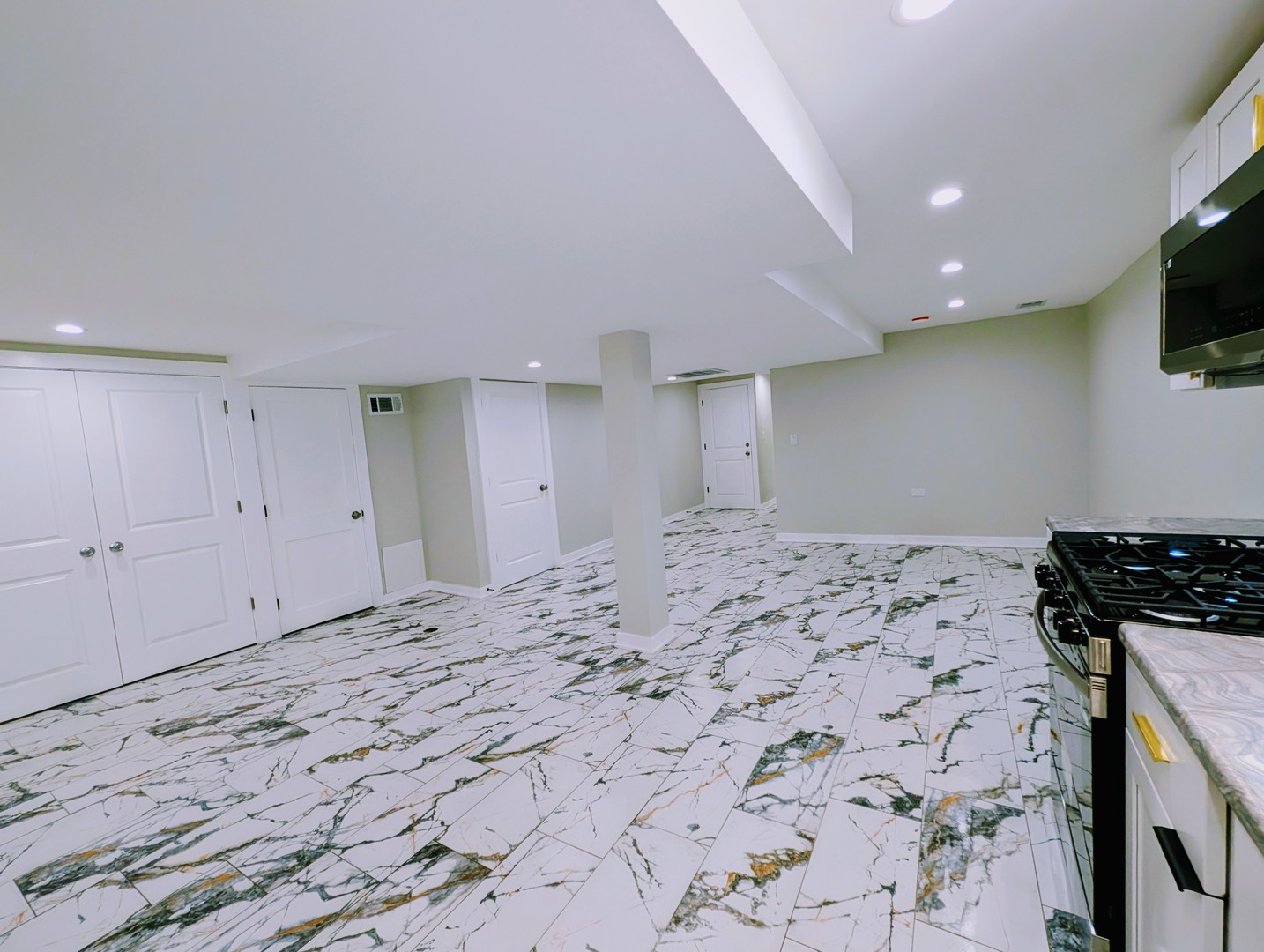 41 West 14th Place, Unit B Chicago Heights, IL 60411 - Photo 3 of 16 a bedroom with a bed and a flat screen tv