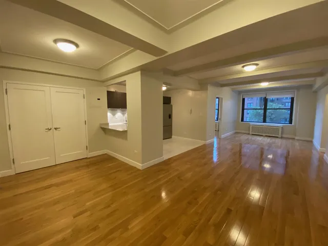 a view of an empty room and window