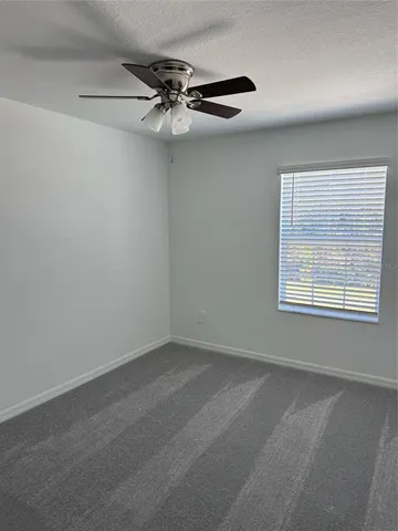 a view of a room that has a window in it