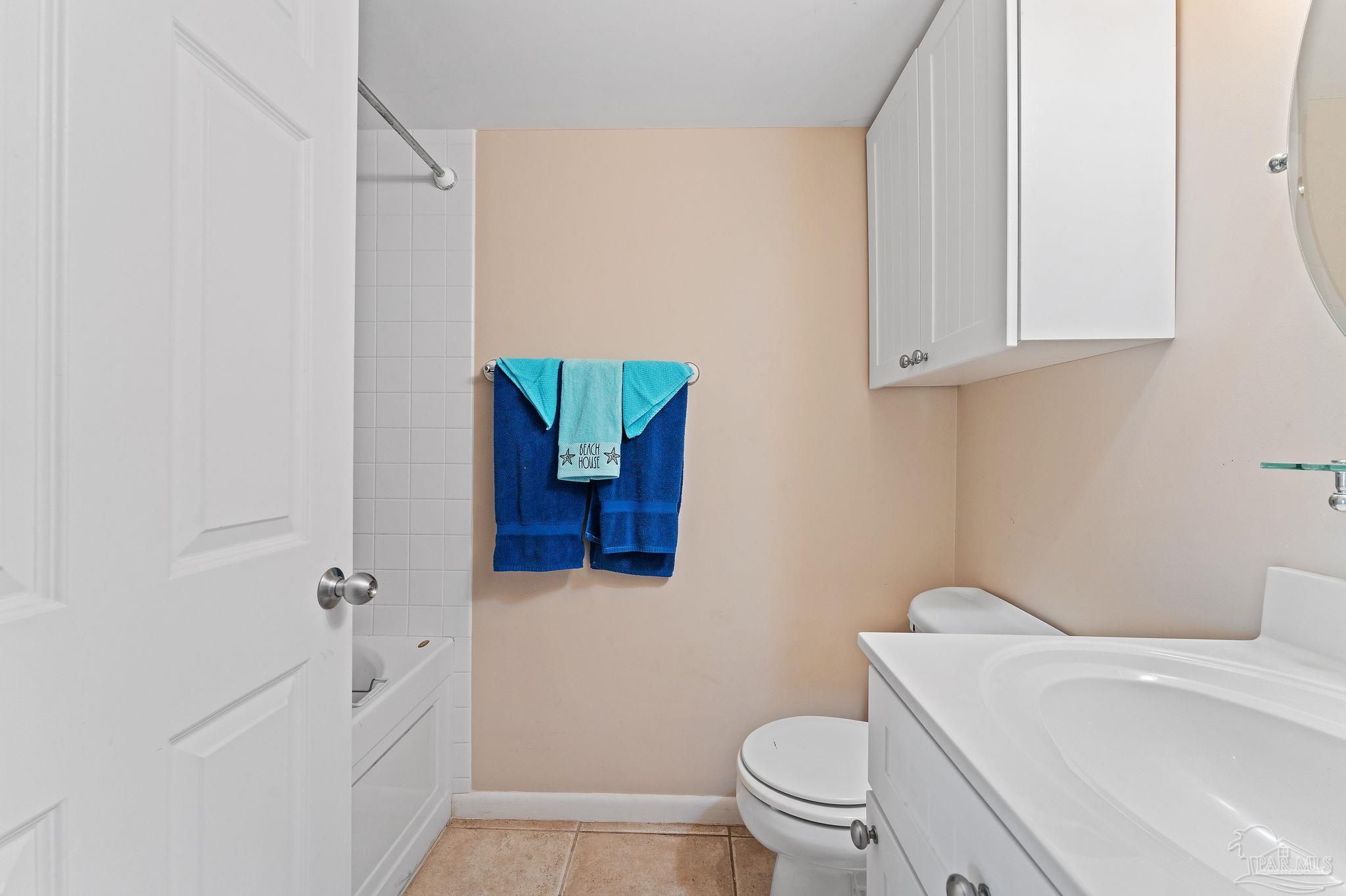 14623 Perdido Key Drive, Unit W106 Perdido Key, FL 32507 - Photo 11 of 50 a bathroom with a sink a toilet and shower