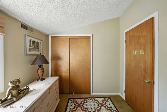 a view of a livingroom with furniture and wooden floor