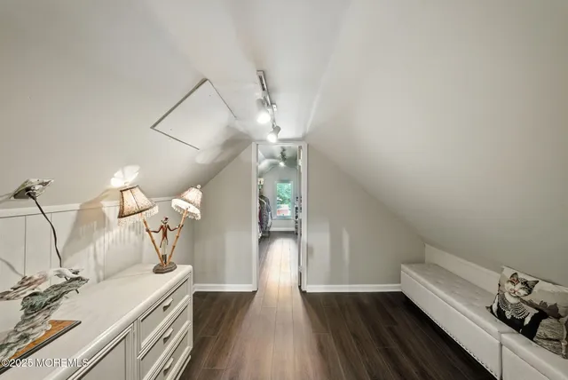 a view of a livingroom with furniture and toys