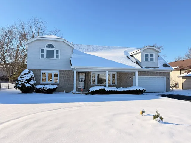 a front view of house with yard