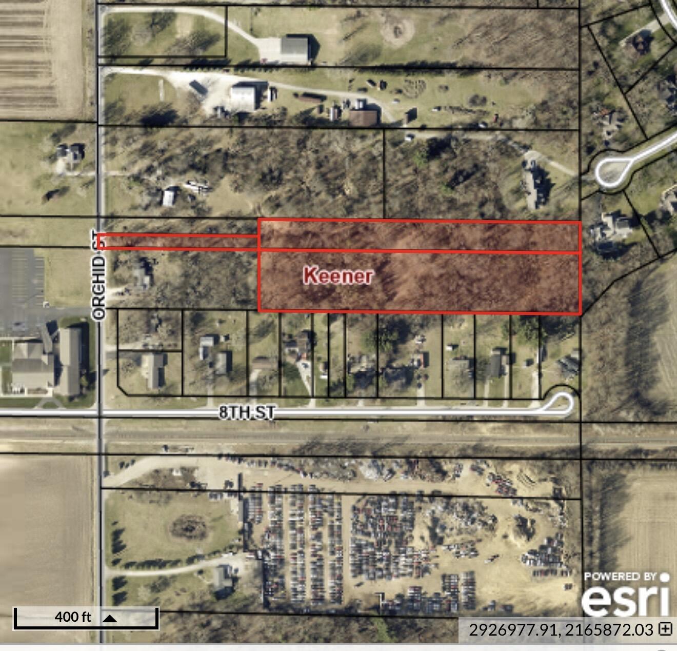 655 Orchid Street Southeast De Motte, IN 46310 - Photo 19 of 19 a front view of a building with a yard