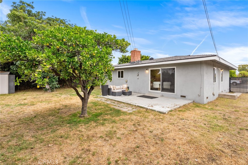13361 Roxey Drive Garden Grove, CA 92843 - Photo 19 of 31 a house view with a backyard space