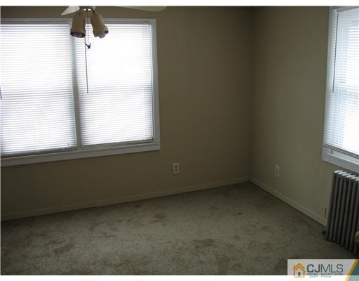 490 Harding Road Old Bridge, NJ 08879 - Photo 8 of 24 an empty room with a window
