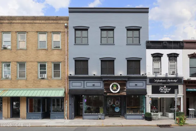 a view of a building with a street