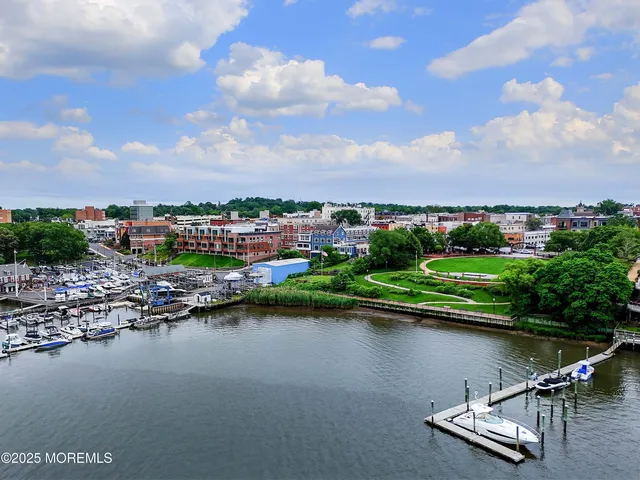 a view of a lake with a city