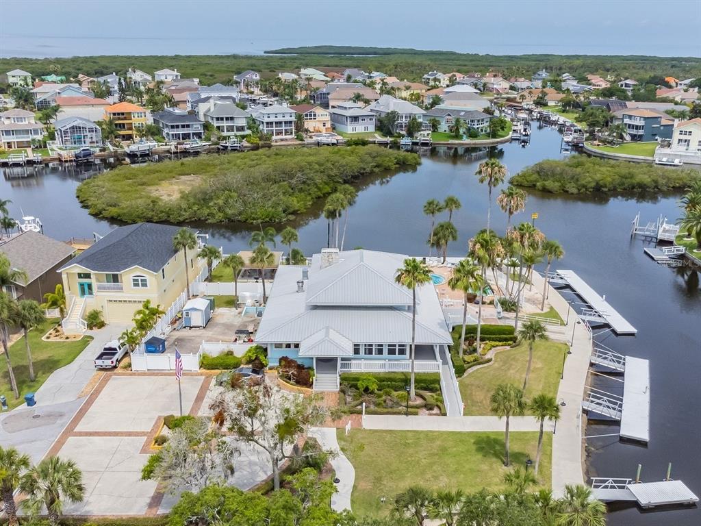 6241 Bayside Drive New Port Richey, FL 34652 - Photo 71 of 78 an aerial view of residential houses with outdoor space and lake view