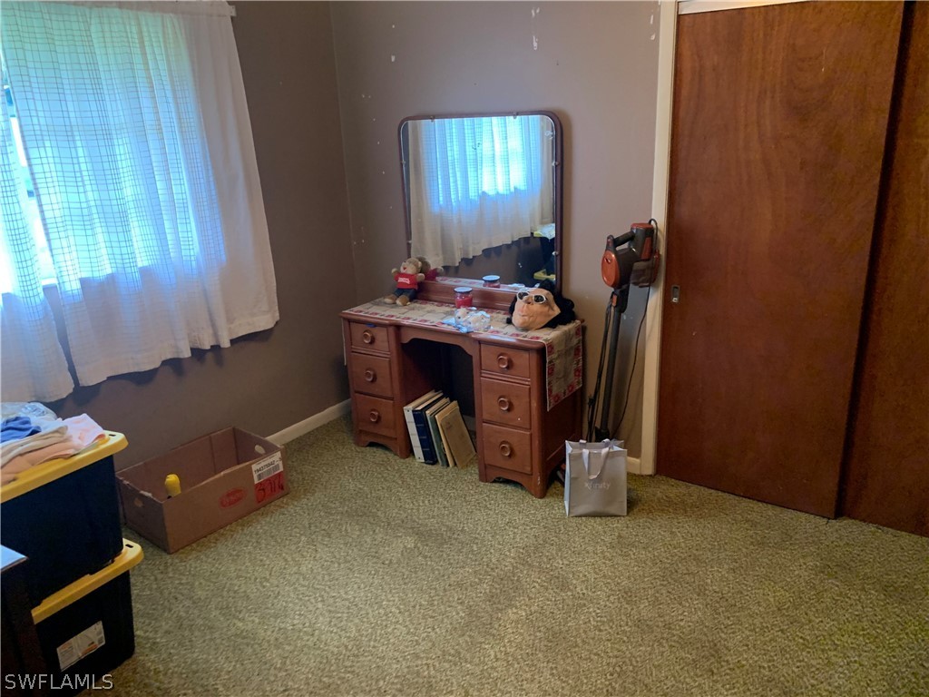 4180 Ellis Road Fort Myers, FL 33905 - Photo 18 of 26 a room with storage and utility