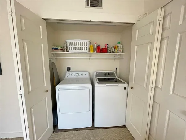 a view of a livingroom with furniture