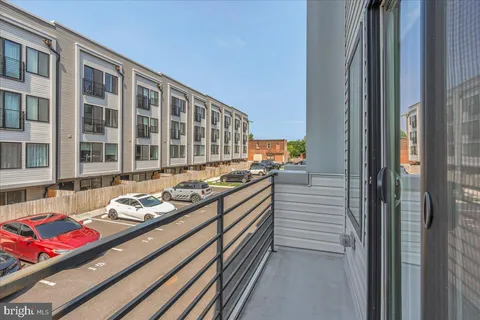 a front view of a building with a lot of windows