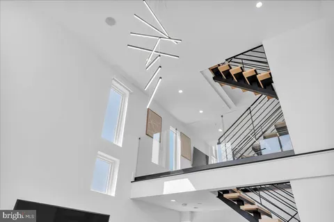 a view of a hallway with staircase