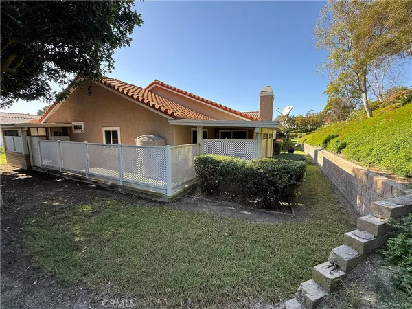 a house view with a garden space