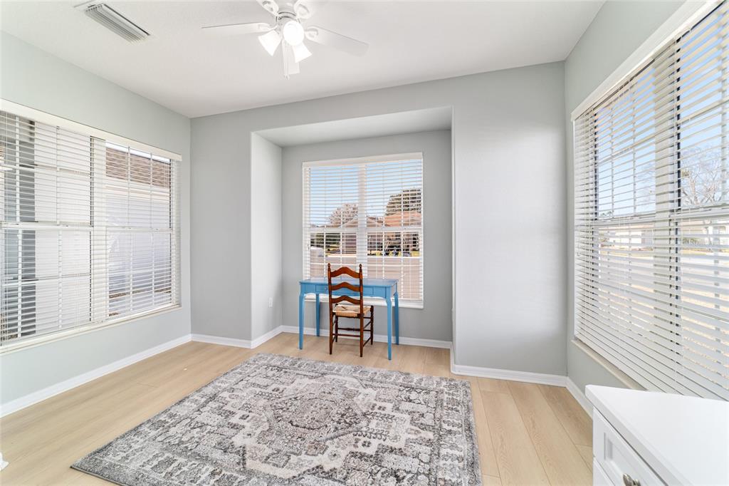 9612 Southeast 124th Loop Summerfield, FL 34491 - Photo 29 of 60 a living room with furniture and a window