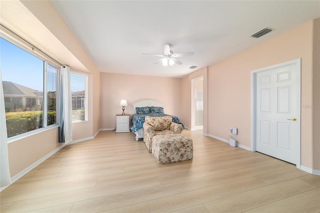 9612 Southeast 124th Loop Summerfield, FL 34491 - Photo 32 of 60 a living room with furniture and a large window