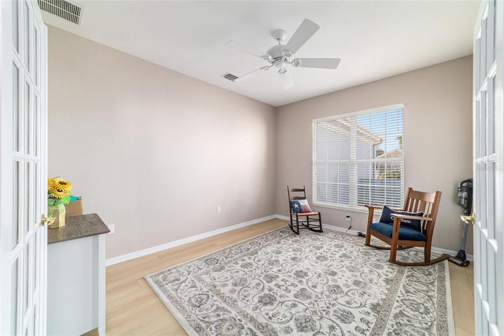9612 Southeast 124th Loop Summerfield, FL 34491 - Photo 48 of 60 a living room with furniture and a window