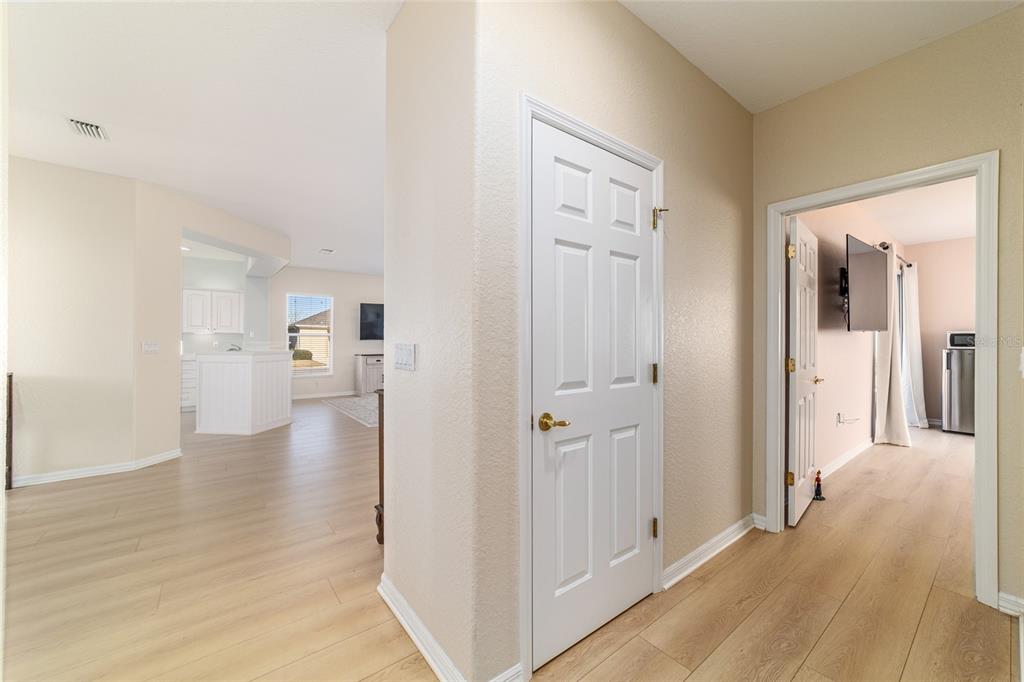 9612 Southeast 124th Loop Summerfield, FL 34491 - Photo 50 of 60 a view of a hallway with wooden floor