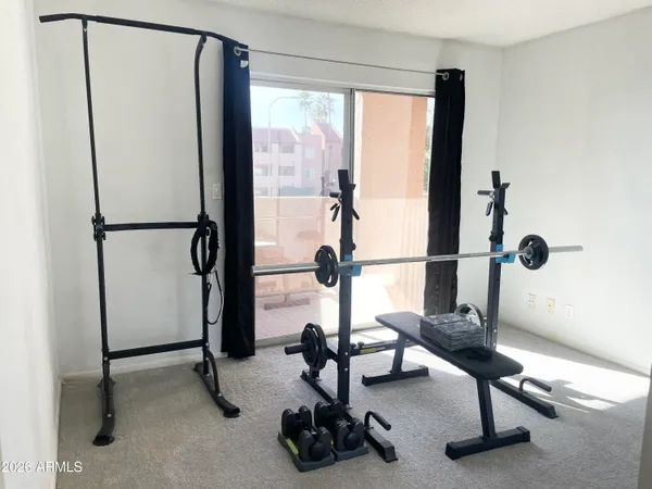 a view of a room with gym equipment