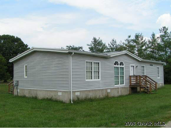 547 Mt Torrey Road Lyndhurst, VA 22952 - Photo 1 of 7 a view of a house with a backyard