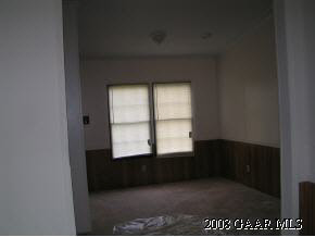 547 Mt Torrey Road Lyndhurst, VA 22952 - Photo 3 of 7 a view of an empty room with a window