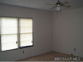 547 Mt Torrey Road Lyndhurst, VA 22952 - Photo 4 of 7 an empty room with a window