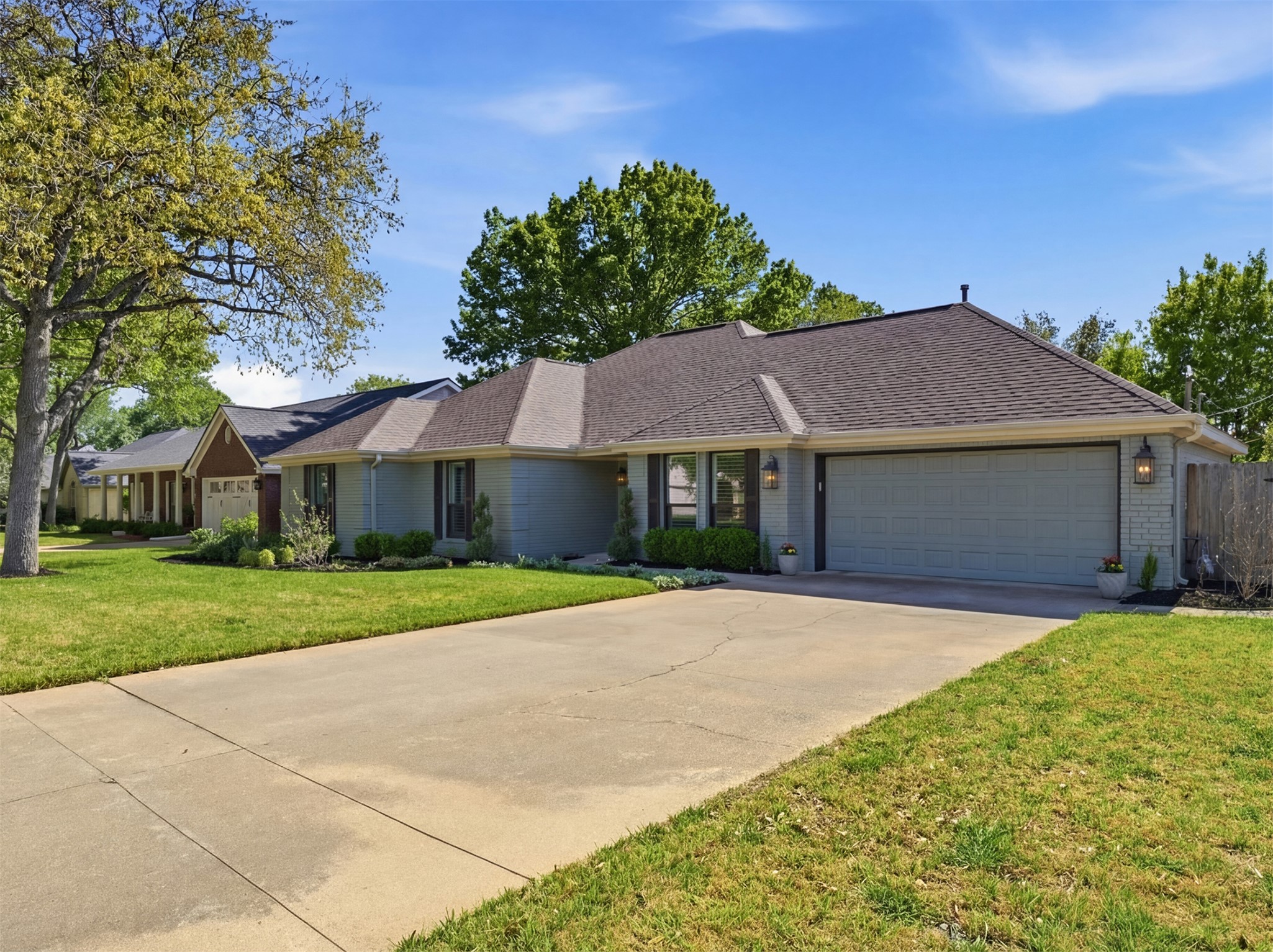 2810 Brandy Lane Georgetown, TX 78628 - Photo 2 of 38 a front view of a house with a yard and garage