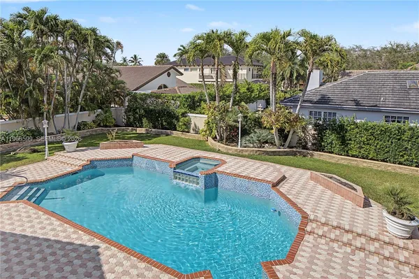 aerial view of a house with swimming pool