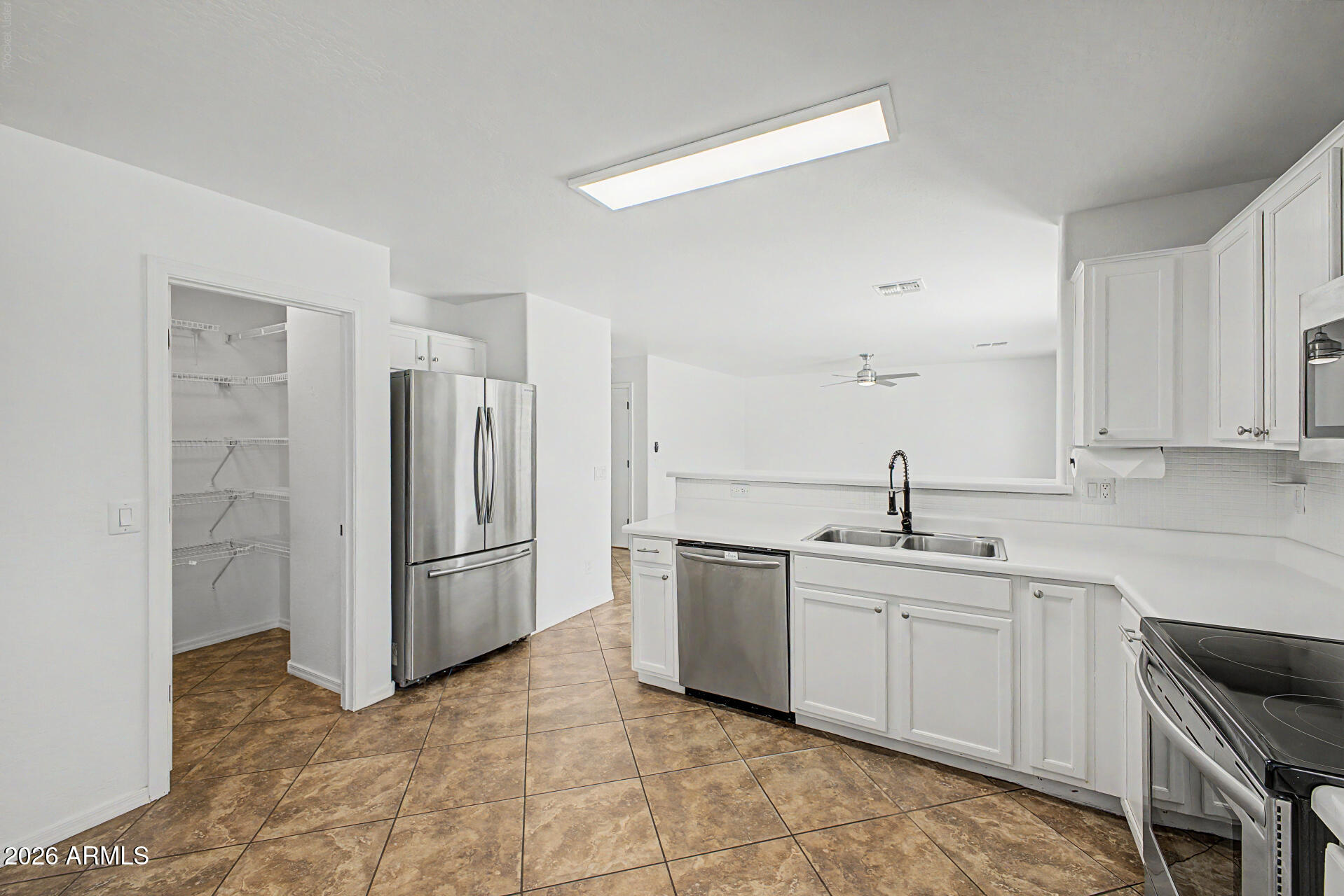 8337 West Payson Road Tolleson, AZ 85353 - Photo 16 of 44 Refrigerator and walk in Pantry
