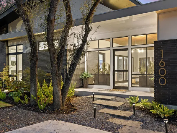 a house with outdoor seating space